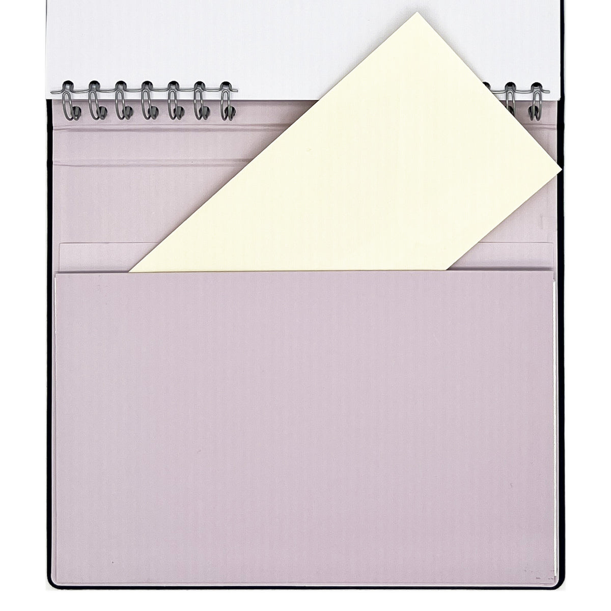 The large built-in back pocket of The Gracious Goodbye Essentials with a folded document tucked inside.